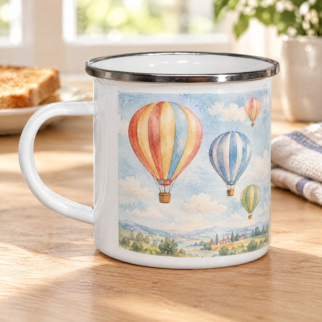 12oz white sublimation enamel mug printed with watercolour hot-air balloons, on a wooden kitchen table