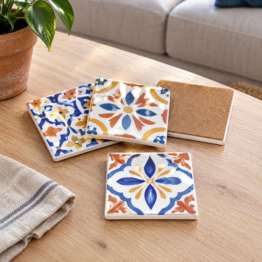 Blank sublimation ceramic coaster, square, printed with blue and orange Mediterranean tiles, on a wooden coffee table